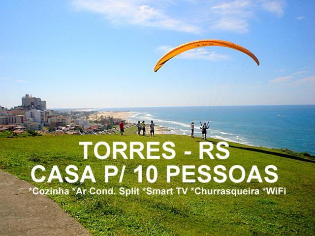 Casa De 2 Quartos Com 2 Ares-Condicionados Em Torres-Rs - Na Mais Bela Praia Gaucha - Cozinha - Banheiro - Tv Smart 32 E Wi-Fi - Estacionamento - Anfitria Superhost No Bnb别墅 外观 照片
